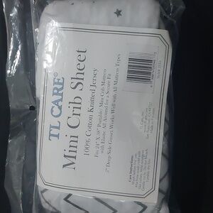 NWOT mini crib sheets